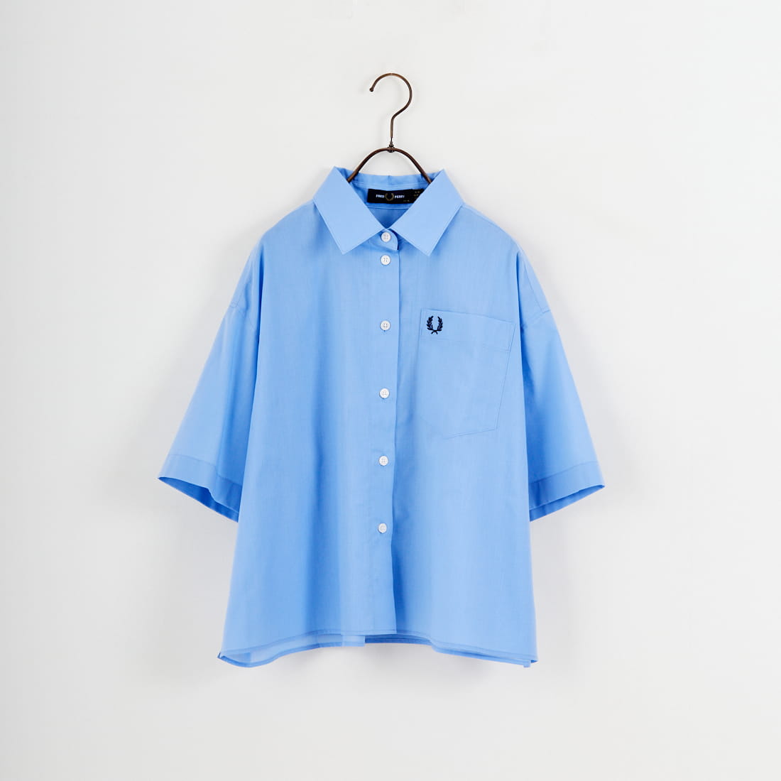 FRED PERRY [フレッドペリー] 別注 ワンポイントロゴ刺繍シアーシャツ [FPW-26S-035JF]の商品画像です。